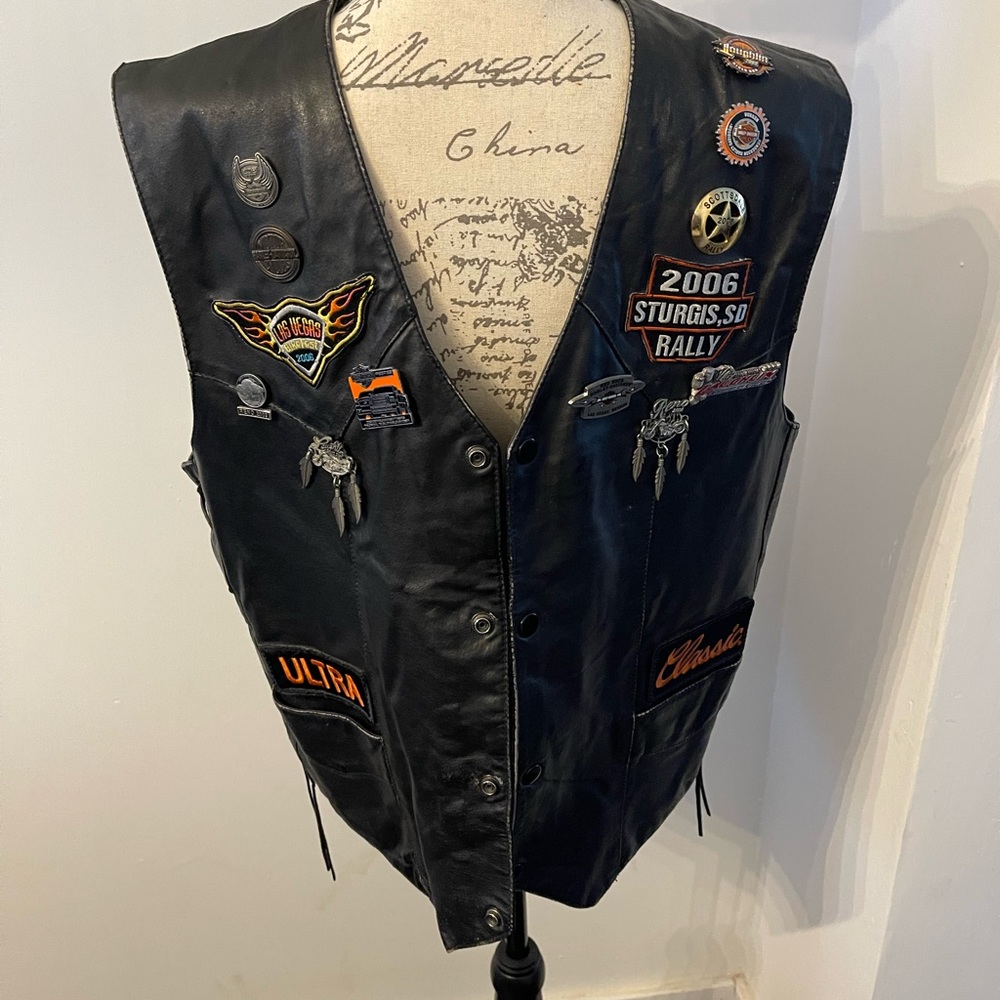 Leather Motorcycle vest with patches and pins